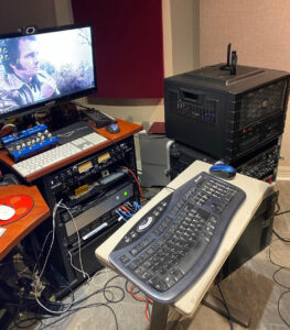 Joe's studio computer with rack equipment and other gear