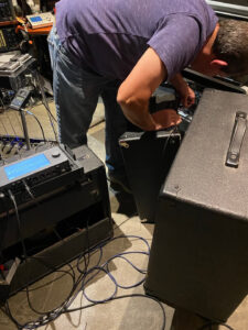 Joe working with several amplifiers and a Quad Cortex